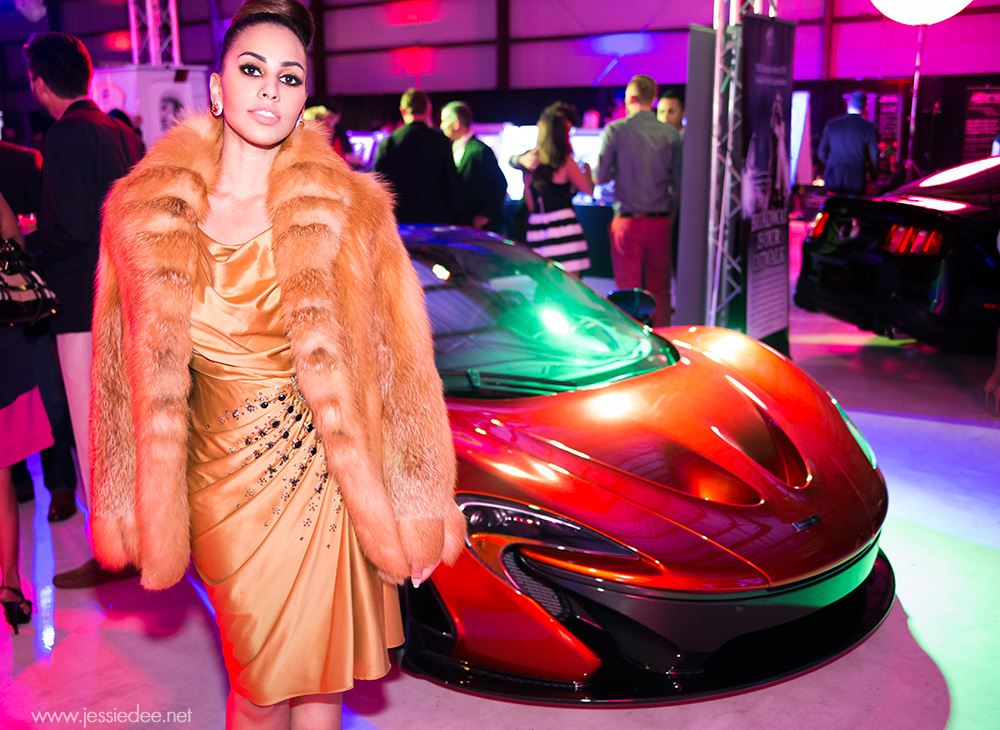 Red Mclaren and fashion model at festivals of speed event