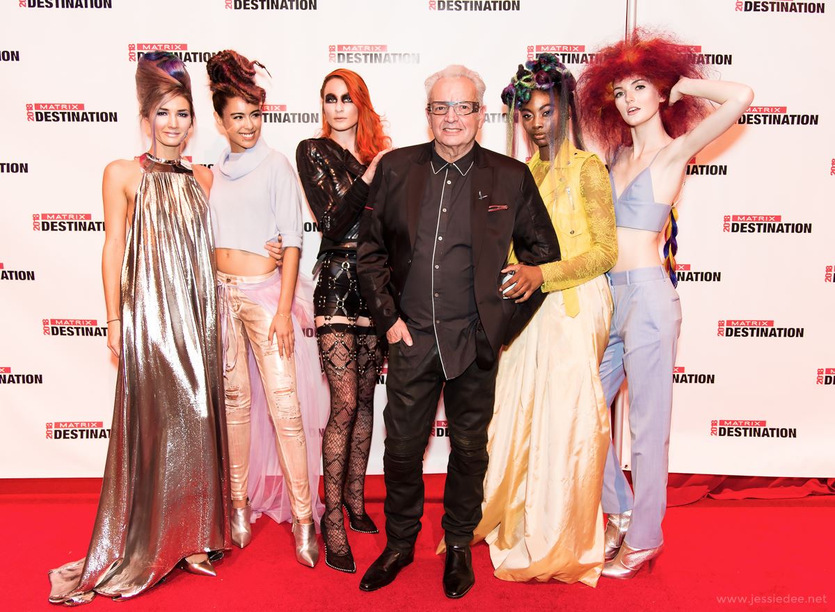 nicholas french on the red carpet with models