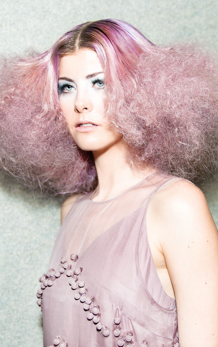 beauty model with pink lavender hair and blue eyeshadow 